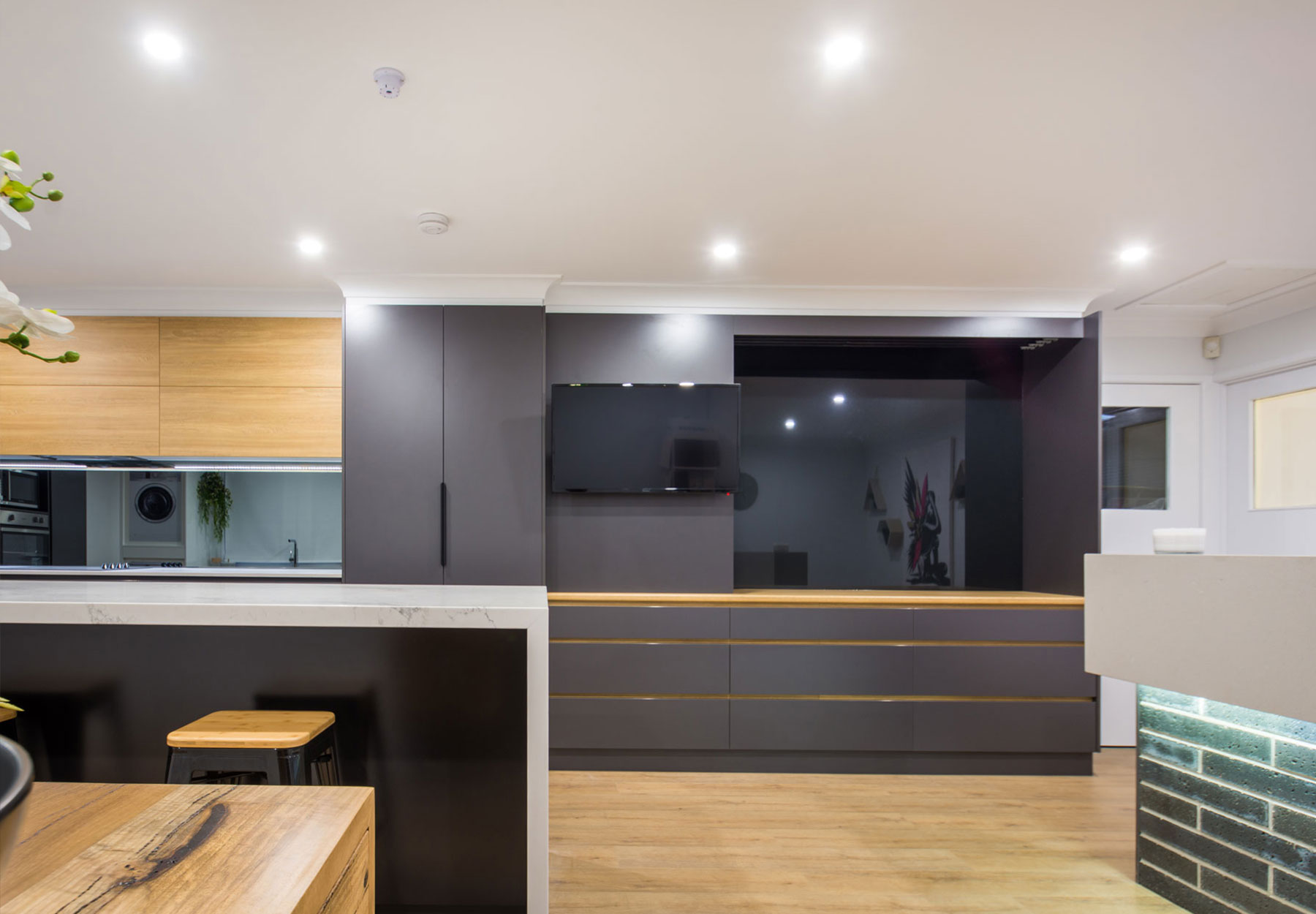 black cabinet and wooden floor style