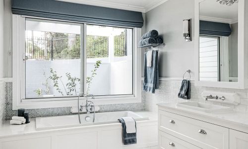 bathtub with a window view